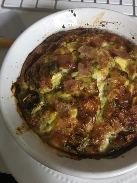 Baked egg dish showing the crusty golden top.